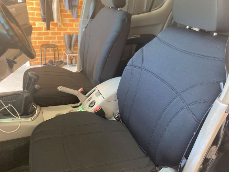 Mitsubishi front seats interior view with seat covers installed